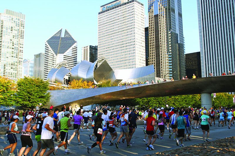 Chicago marathon runners in front of downtown
