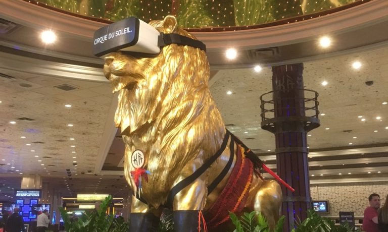 Lion statue with VR goggles on