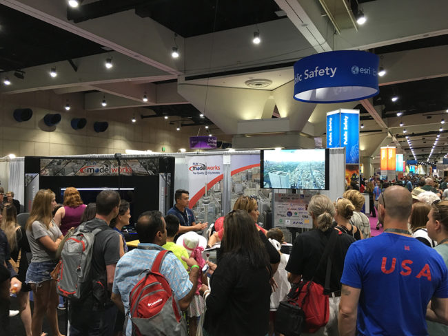 PLW Modelworks booth at ESRI 2017 conference with many attendees listening to presentation