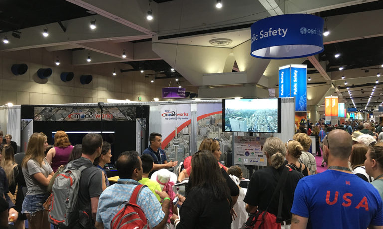 PLW Modelworks booth at ESRI 2017 conference with many attendees listening to presentation